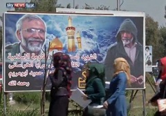 نصب تصاویر شهدای سپاه در خیابان های بغداد (+عکس)